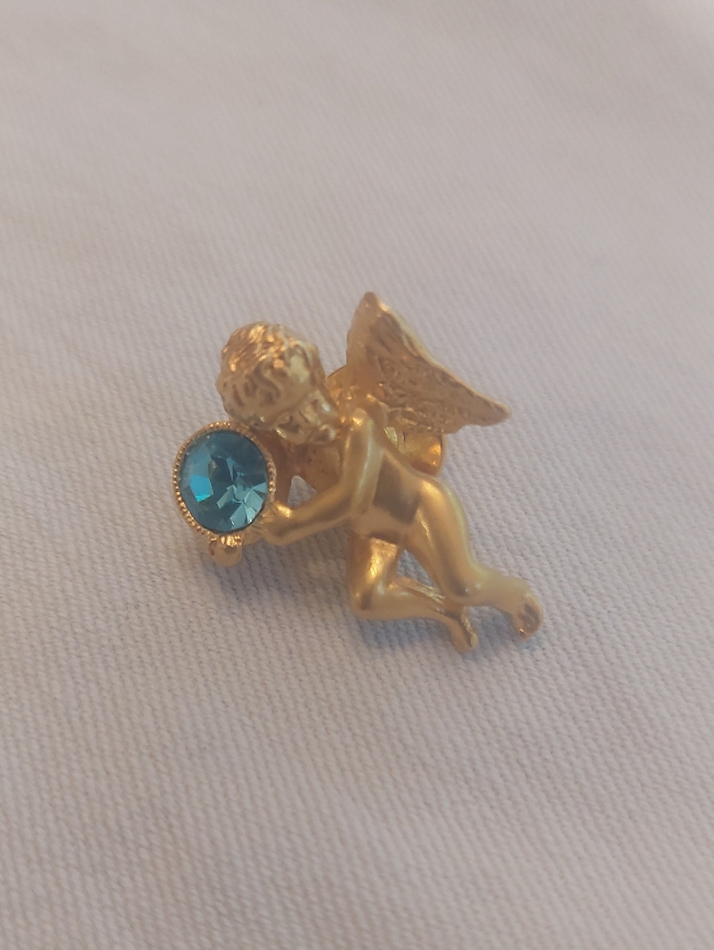 Source Unknown Gold Angel Brooch with Blue Stone